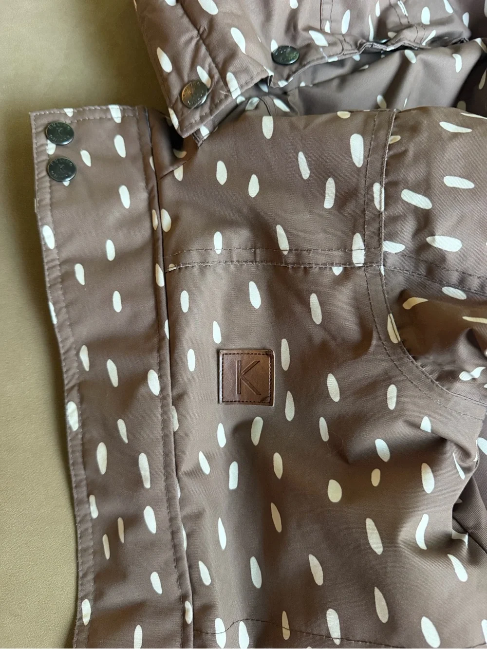 Kuling Brown Coat with White Dot Accents